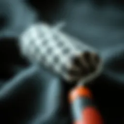 Close-up of a lint roller removing pet hair from fabric