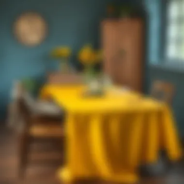 Vibrant Yellow Tablecloth on Rustic Table A vibrant yellow vinyl tablecloth draped over a rustic wooden table.