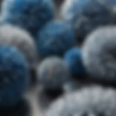 Close-up of handcrafted silver and blue pom poms showcasing intricate details