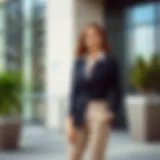 Chic petite teacher outfit featuring a tailored blazer and a flowy blouse with ankle-length trousers