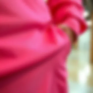 Close-up of fabric textures used in hot pink pants set