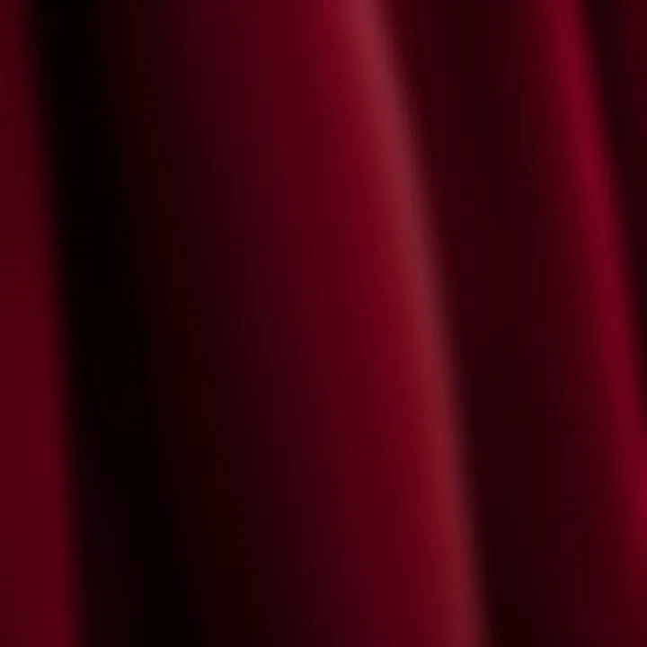 Close-up of maroon fabric showcasing texture and quality