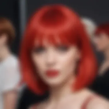 A fashion-forward individual wearing a red glueless wig at an event