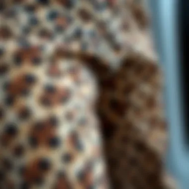 Close-up of the fabric texture and pattern of cheetah pants