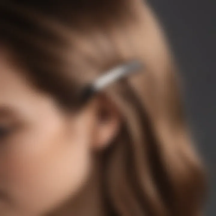 Elegant minimal hair clip on a smooth surface highlighting its sleek design