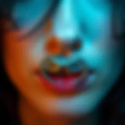 Close-up of a snakebite lip ring showcasing intricate design.