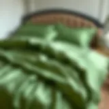 Luxurious green satin duvet cover draped elegantly on a bed