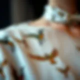 A close-up of a bird print blouse showcasing intricate details
