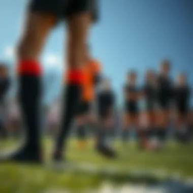 Group of players in fashionable over-the-knee socks on the field