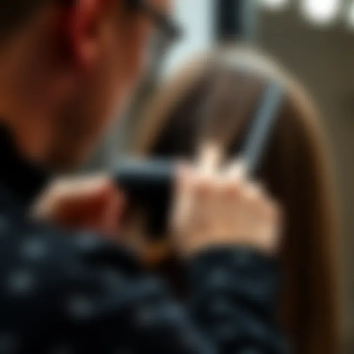 A stylist using a heat resistant rat tail comb on long hair for precise sectioning