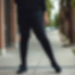 Fashionable plus size black distressed leggings paired with a stylish top