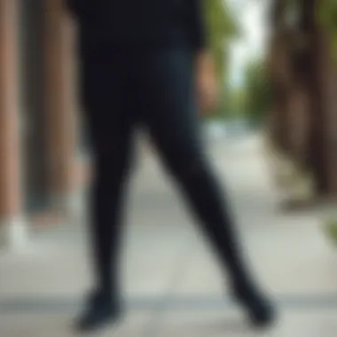 Fashionable plus size black distressed leggings paired with a stylish top