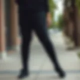 Chic Outfit Inspiration with Distressed Leggings Fashionable plus size black distressed leggings paired with a stylish top