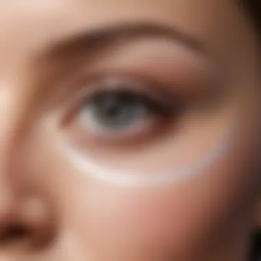 Close-up view of transparent eyelid tape application