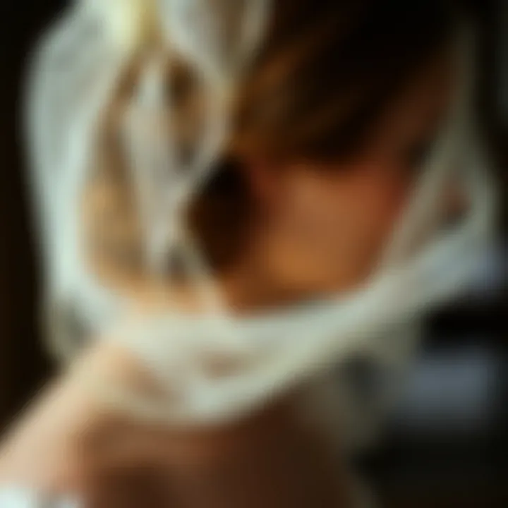 Timeless Veils: Celebrating Historical Significance A close-up of a vintage veil draped gracefully over a bridal hairstyle, highlighting its historical charm.
